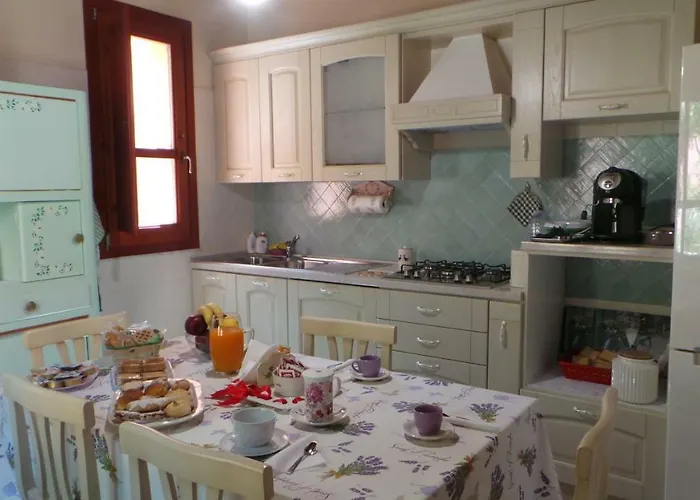 Oasi Ottocento Couette-café Quartu SantʼElena